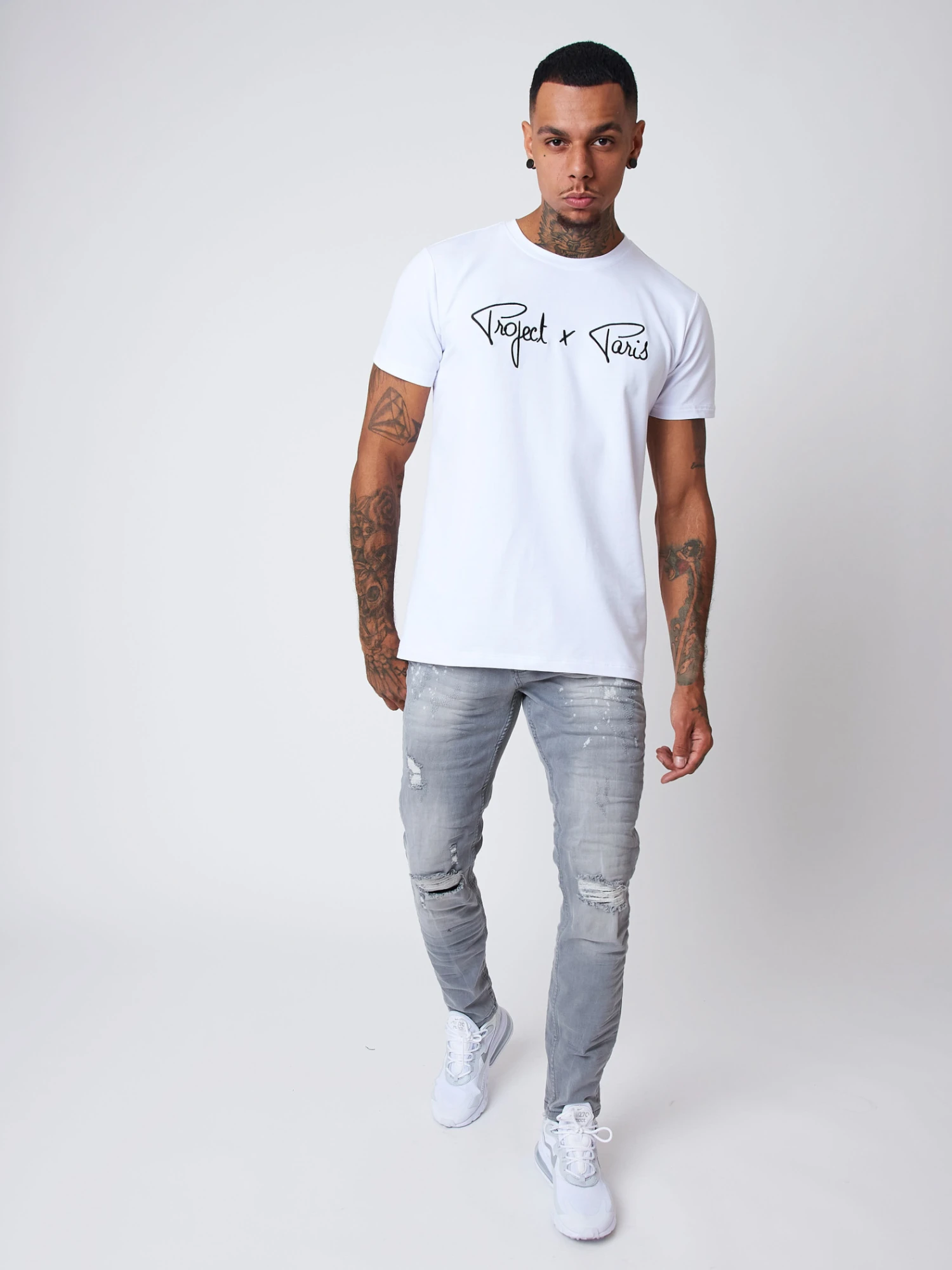 Jean Slim Effet Usé Avec Taches Délavées 4 Jean Slim Effet Usé Avec Taches Délavées – Image 2