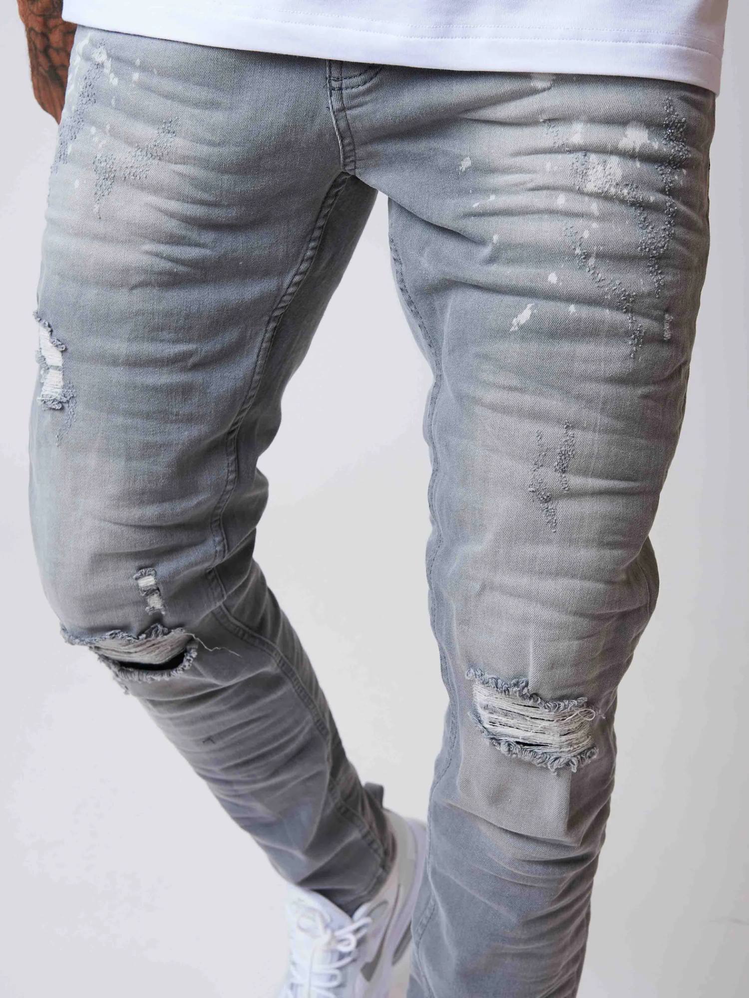 Jean Slim Effet Usé Avec Taches Délavées 3 Jean Slim Effet Usé Avec Taches Délavées