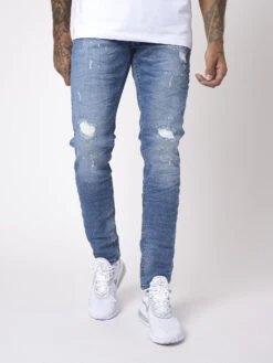 Jean Slim Basic Bleu Effet Usé Et Tacheté